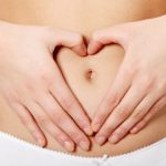 Beautiful female body isolated on white. Sexy young woman in white panties