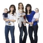 young mothers holding their babies