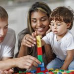 Parents watch the game and the development of their child